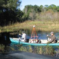 EM-61 survey across a shallow pond to find buried drums