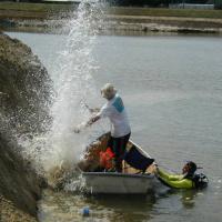Using a Betsy Seisgun as a Seismic Source for an Underwater Refraction Survey (Florida)